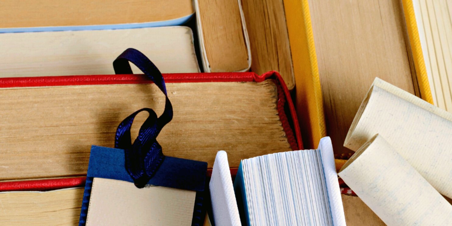 Cluster of books of a variety of colours - Soulshine's Books Section
