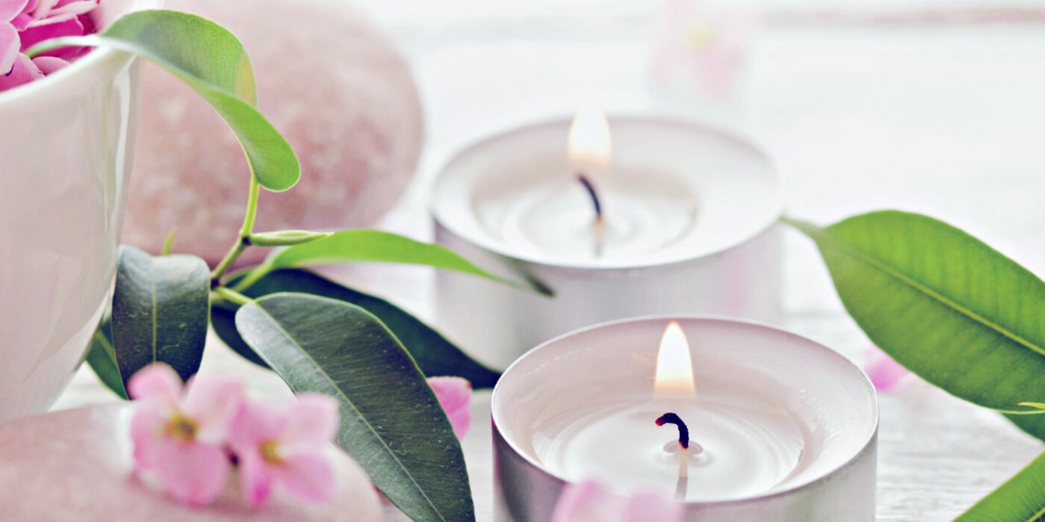 Candles lit in a holistic environment - Soulshine's Candle Section