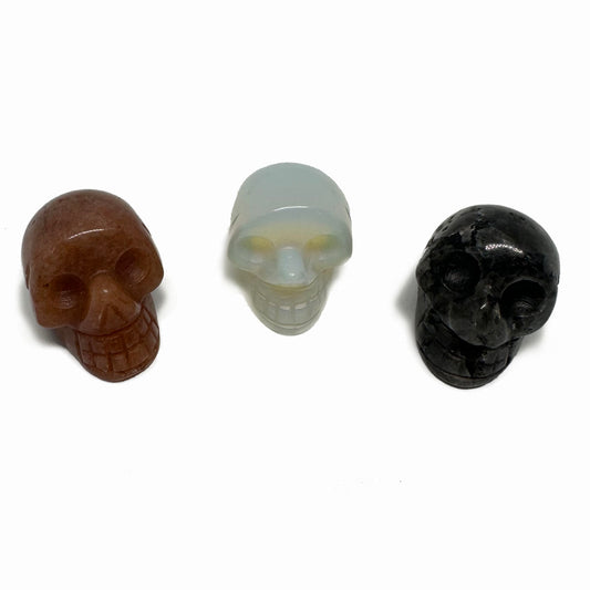 MIXED QUARTZ CARVED SKULL