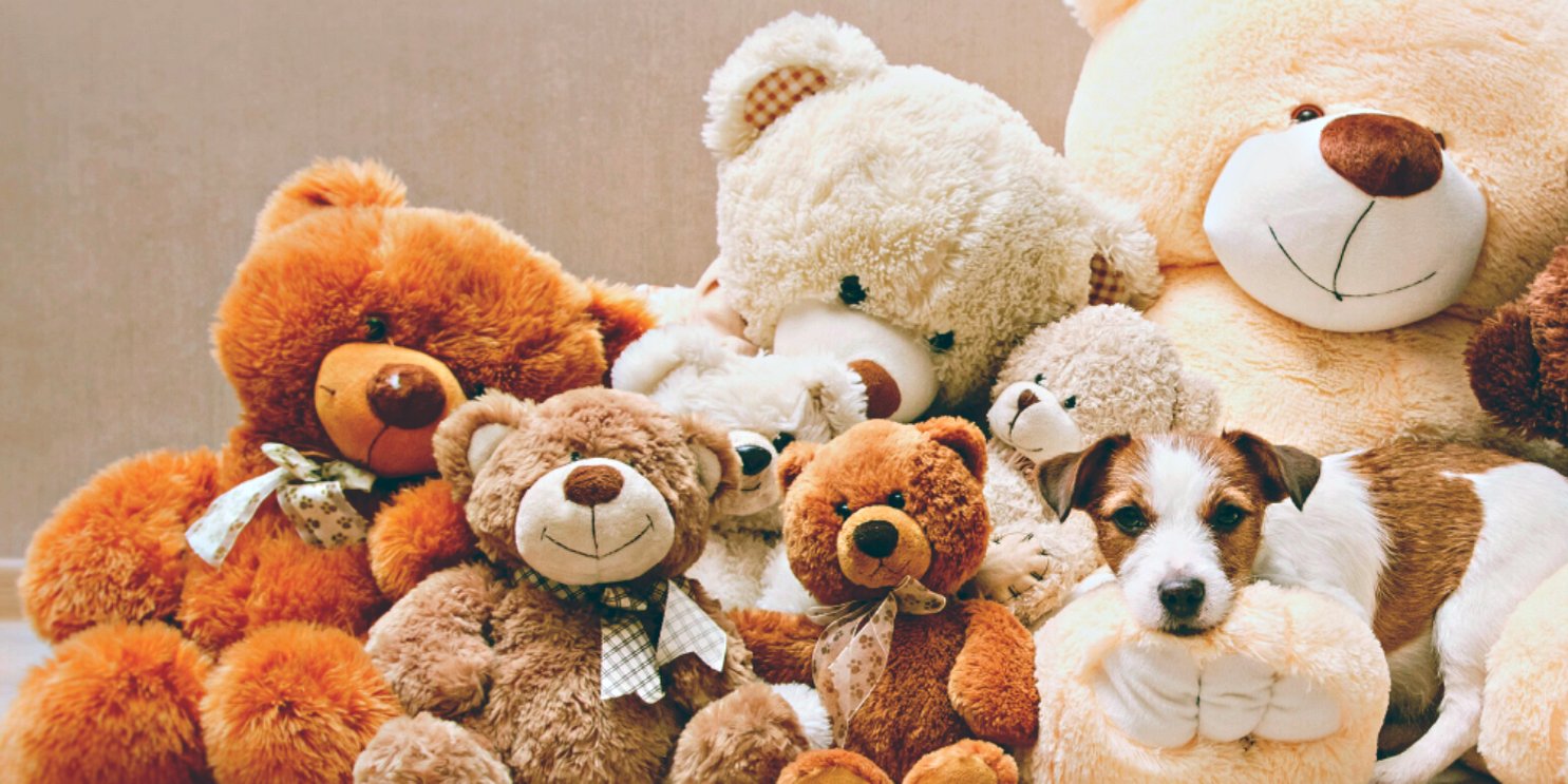 A collection of Teddy Bears with a Jack Russel laying in the middle - Soulshine's Stuffies and Plushies Section