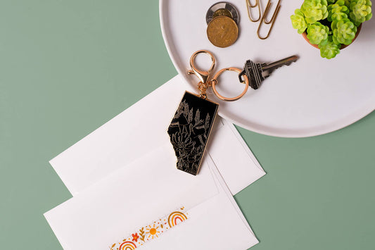 Jaybee Design : Alberta Black & Gold Enamel Mountain Keychain